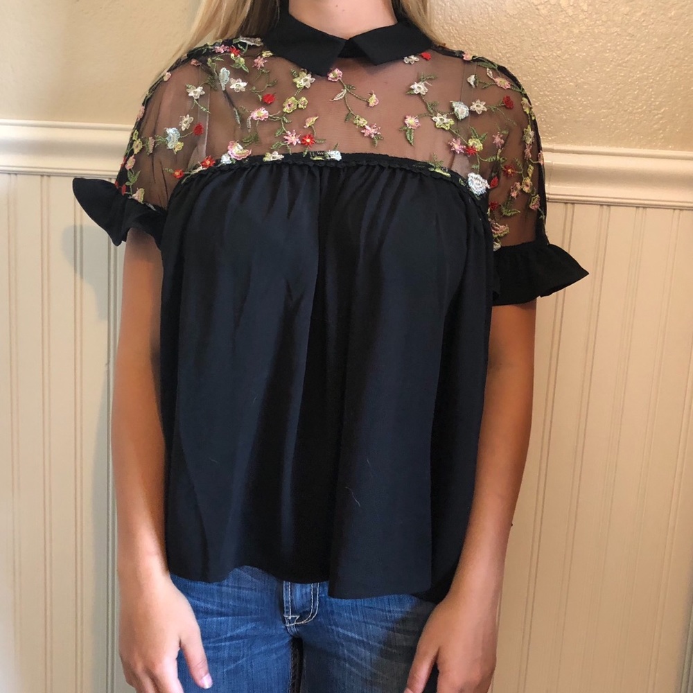 Black and floral blouse